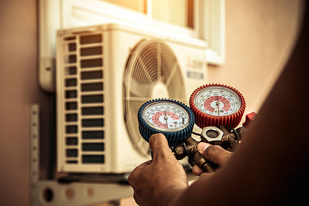 Professional Ac Installation technician working in Waverley, MA